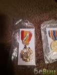 Mint condition military dress pins include the PURPLE HEART, Colorado Springs, Colorado